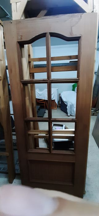 Puerta 6 cristales chapada en sapelly