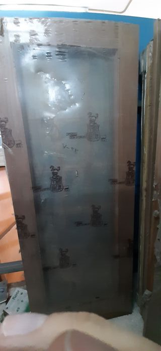 Puerta 1 cristal grande chapada en sapelly