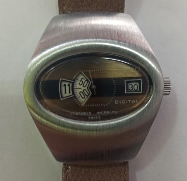 Reloj Vintage horas saltantes Jump Hour HERMO -Swi