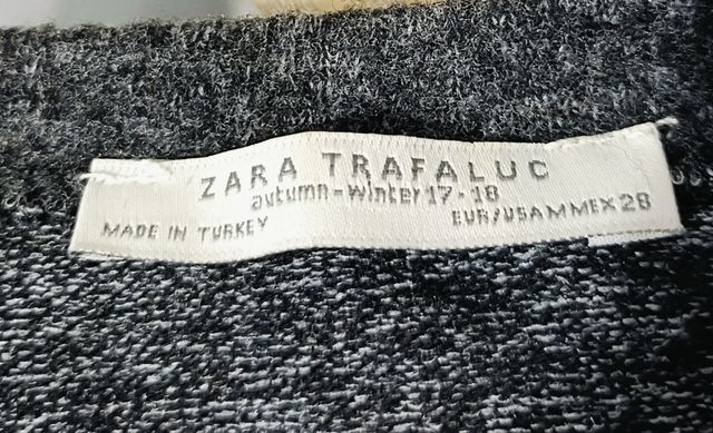 Maglia grigio melange con perline