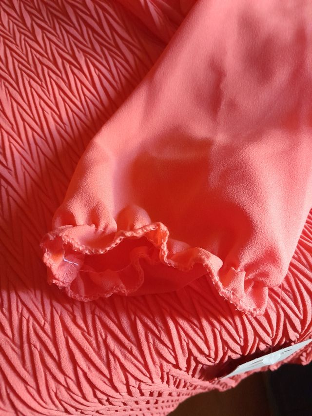 Blusa plisada.