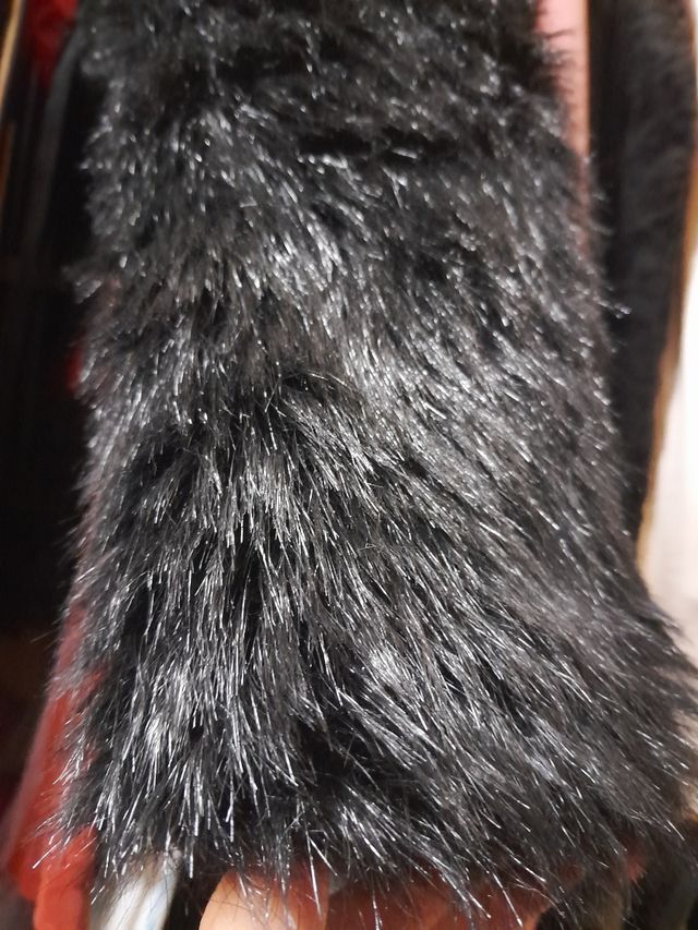 Bolero pelo sintético.