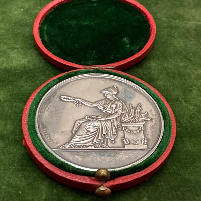 Antigua medalla. Brenet