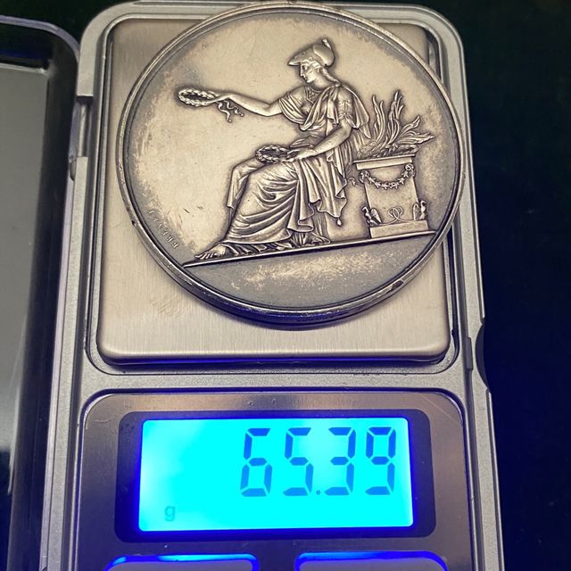 Antigua medalla. Brenet