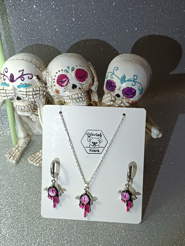 Conjunto pendientes y collar ojo