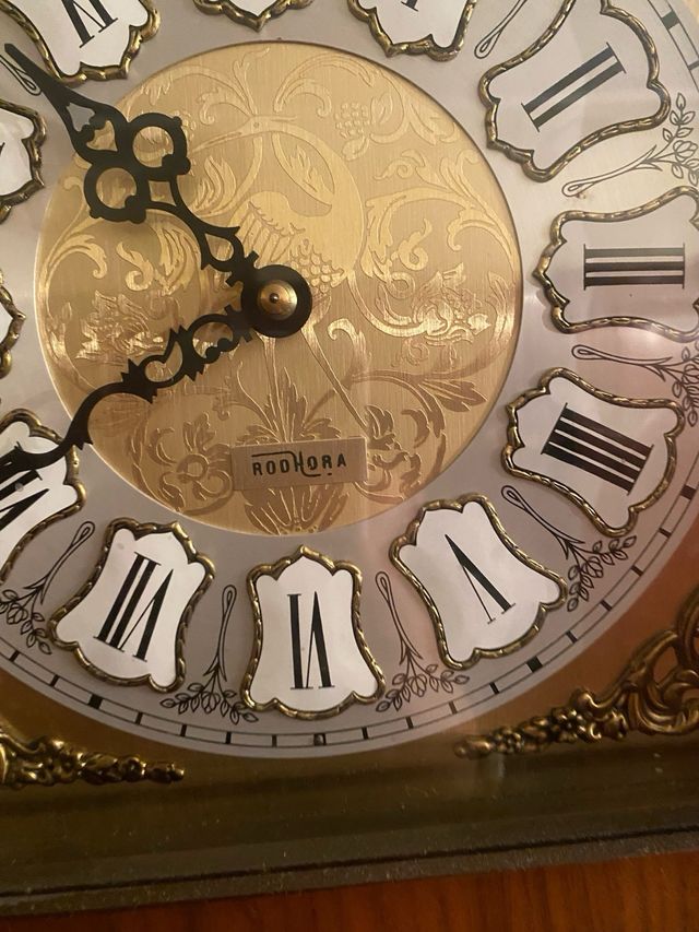 Reloj de pared con pendulo