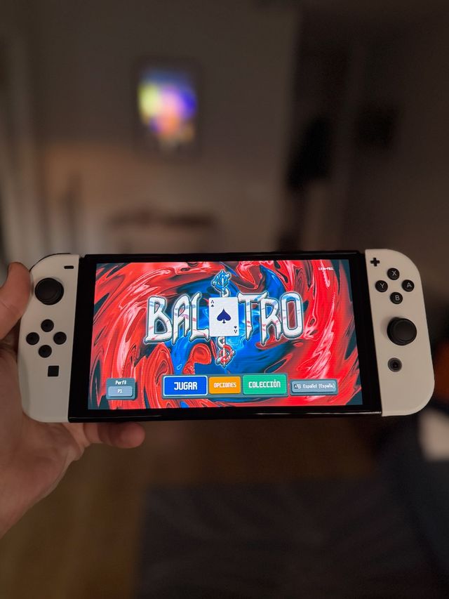 Nintendo Switch OLED + Gioco + microSD da 128 GB