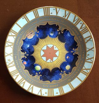 Dos platos de adviento del millennio dorado