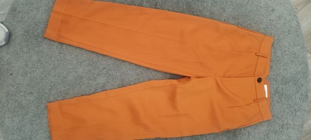 Pantalón pinzas. Naranja. Lefties. T 34