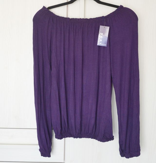 maglia viola maniche lunghe spalle scoperte