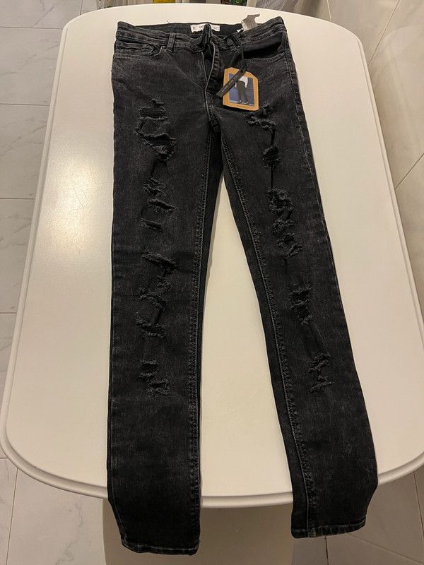 Pantalón vaquero negro