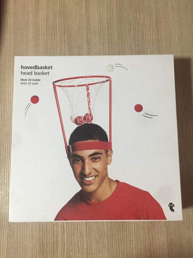 Juego canasta para la cabeza