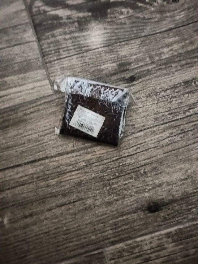 Cartera marrón oscuro de piel