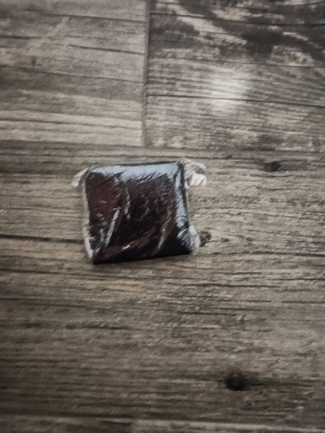 Cartera marrón oscuro de piel