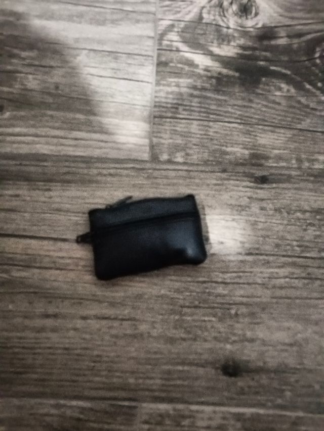 Cartera negra de piel 