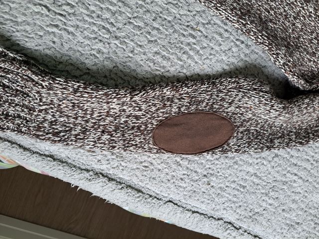 Jersey de cuello cisne con coderas.