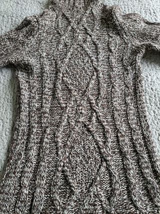 Jersey de cuello cisne con coderas.