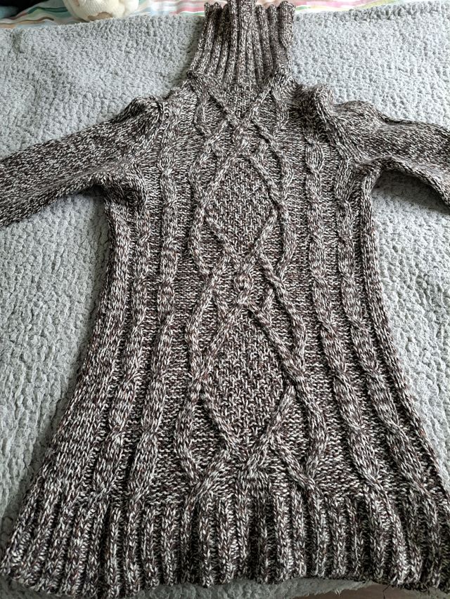 Jersey de cuello cisne con coderas.