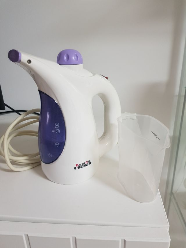 Ferro da stiro, stiratore verticale