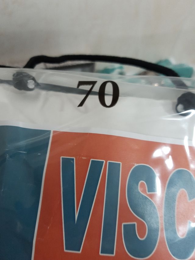 Almohada viscoelástica y plumas