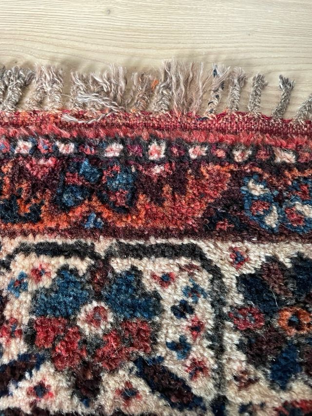 Alfombra antigua de lana