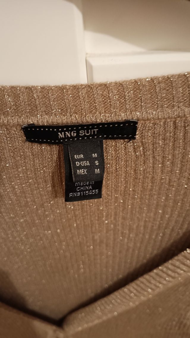 Vendo chaqueta de punto dorada