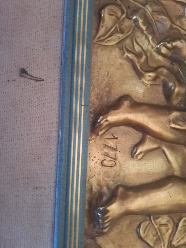 Sbalzo in rame e ottone stile barocco.