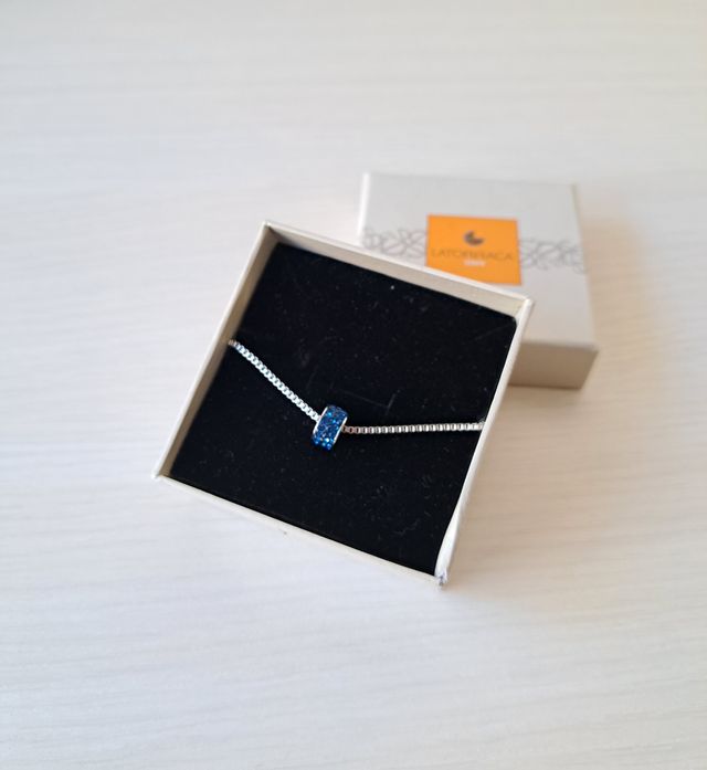 Bracciale con ciondolo blu