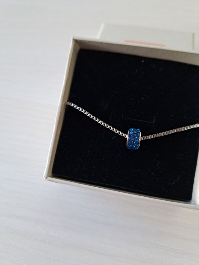 Bracciale con ciondolo blu