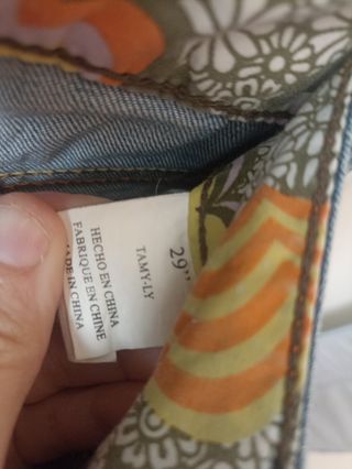 Vaqueros vintage con el símbolo de la mujer