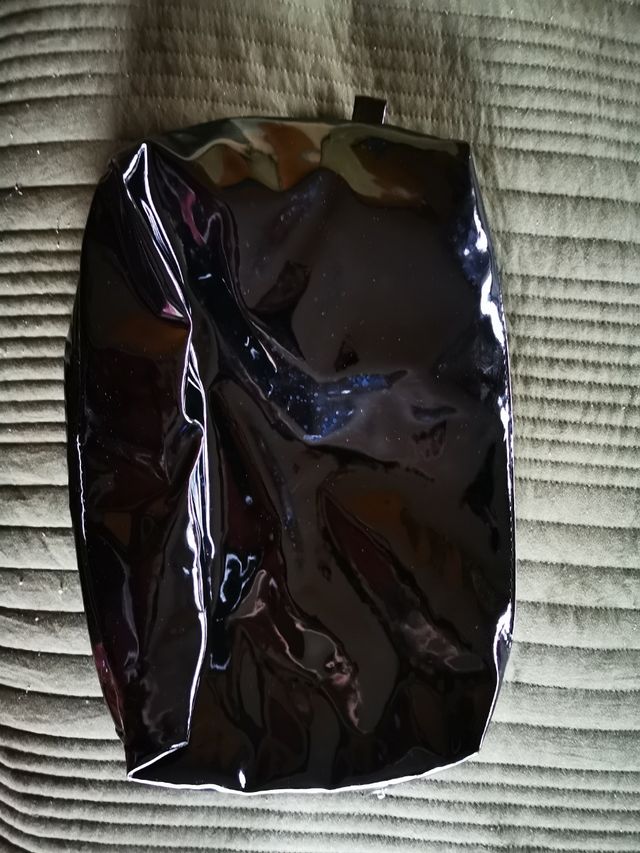 Bolso transparente con neceser dentro