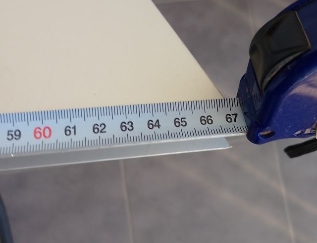 Logo DAINESE en hierro.