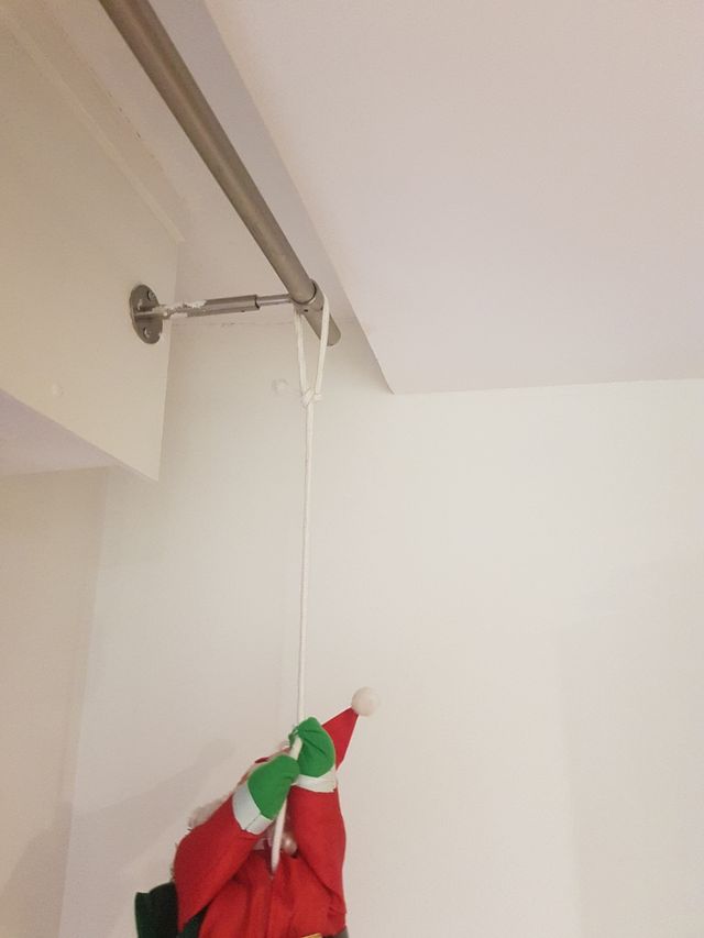 Santa claus escalando