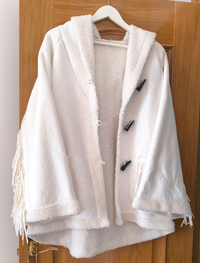 Chaqueta flecos