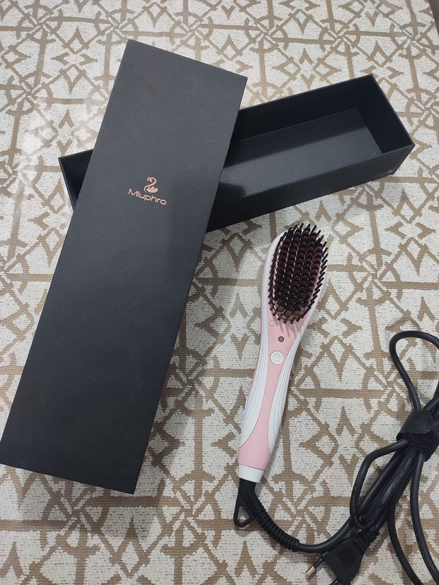 Piastra per capelli a spazzola