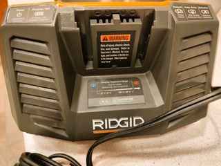 Cargador de baterías AEG BL1418 nuevo