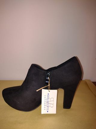 Zapatos abotinado