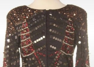 Chaqueta con abalorios de Almatrichi 