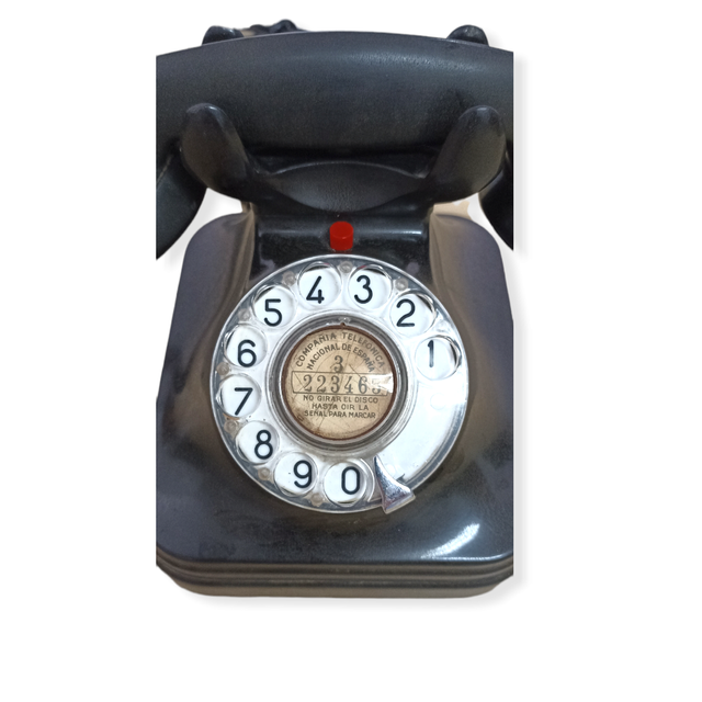 Teléfono antiguo negro baquelita.