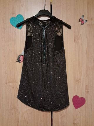 Blusa negra brillante