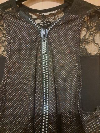 Blusa negra brillante