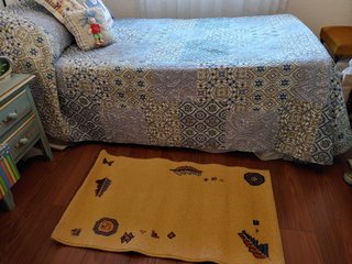 Alfombra pie de cama
