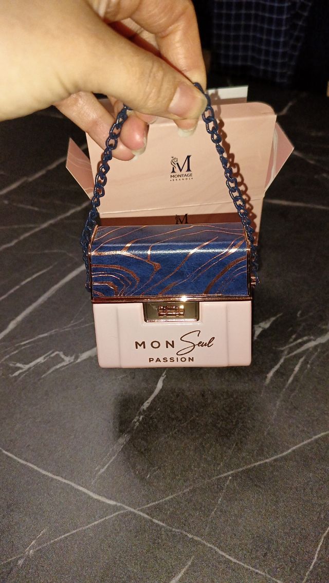 Profumo donna forma borsetta 