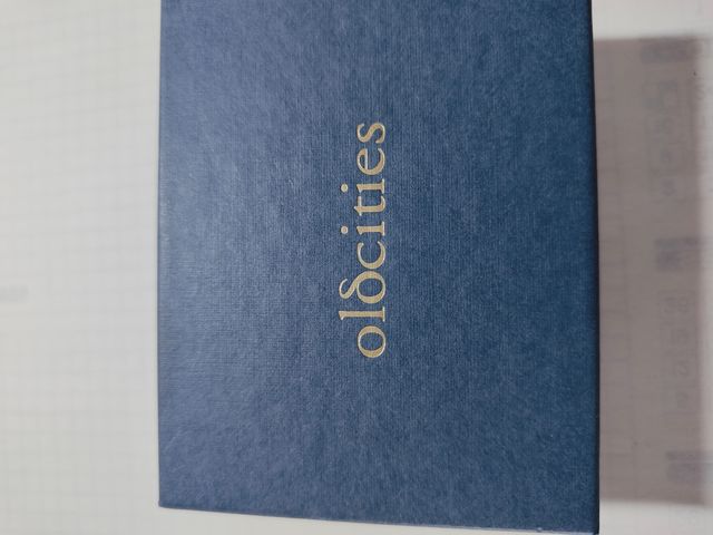 Pendientes y colgante a juego plateado