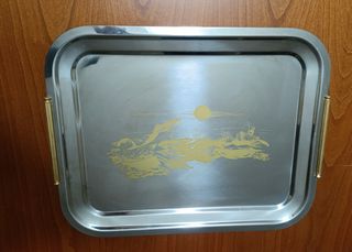 Vassoio in acciaio decorato
