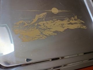 Vassoio in acciaio decorato