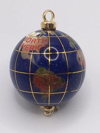 Esfera mapa mundi en oro  18k y lapislazuli