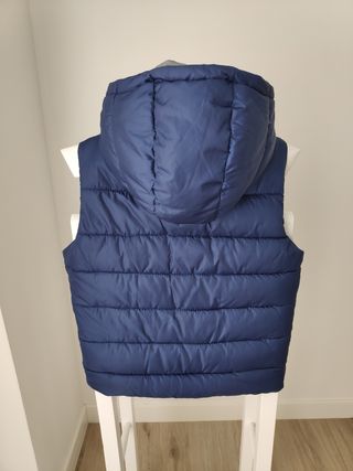 Chaleco plumas de niño, 10 años.