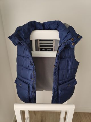 Chaleco plumas de niño, 10 años.