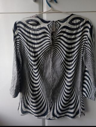 Blusa estampado cebra. Oky Coky. T42